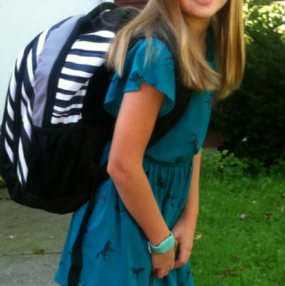 Girls dress with horse and heart pattern